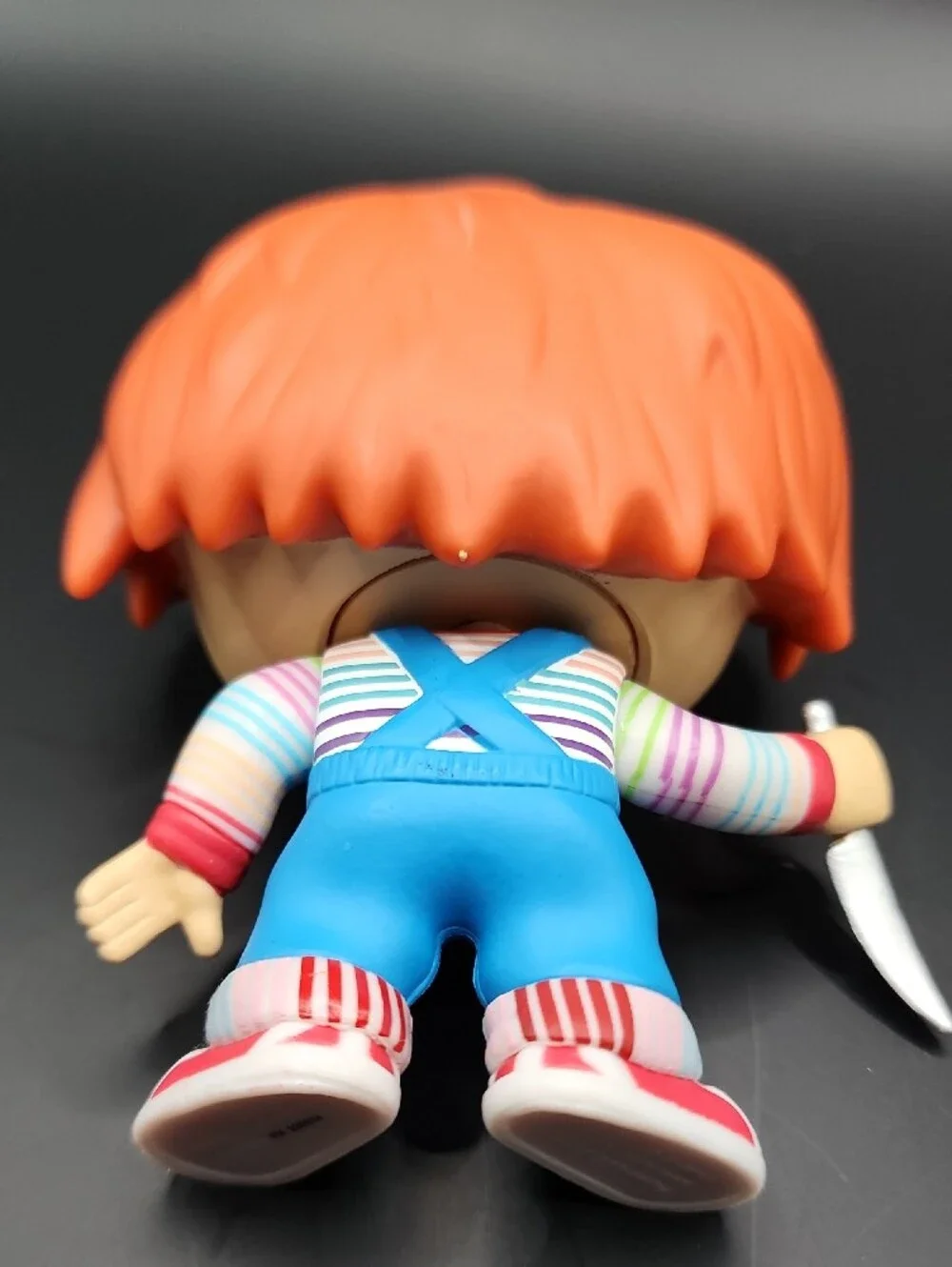 Funko Chucky Vinyl Figure with Orange Hair and Blue Overalls